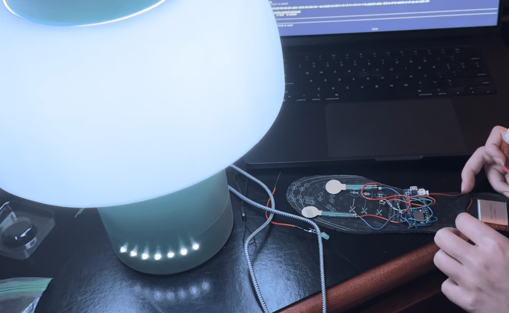 Vince configures the sensors inside the Neevel insoles