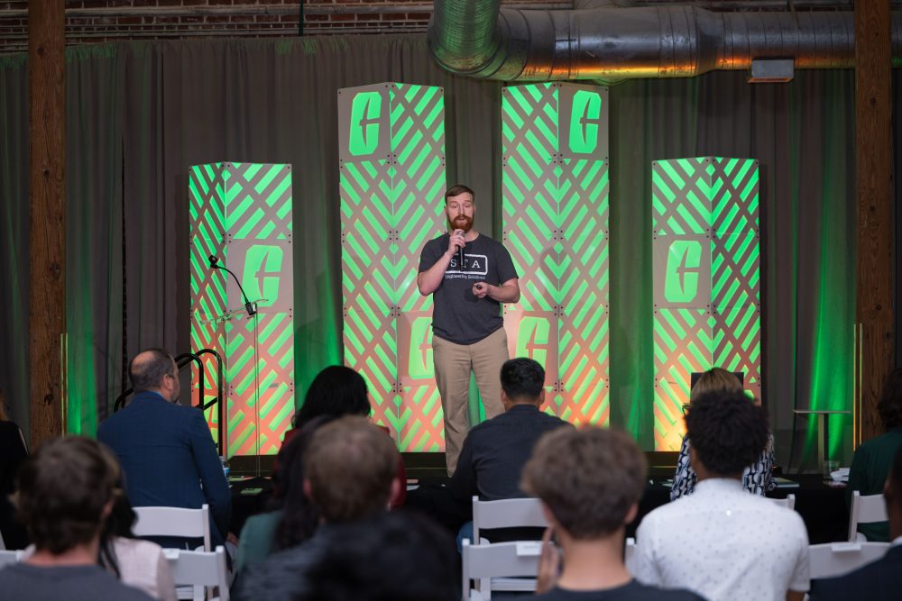 Steven Bowers speaking to a crowd during the pitch competition