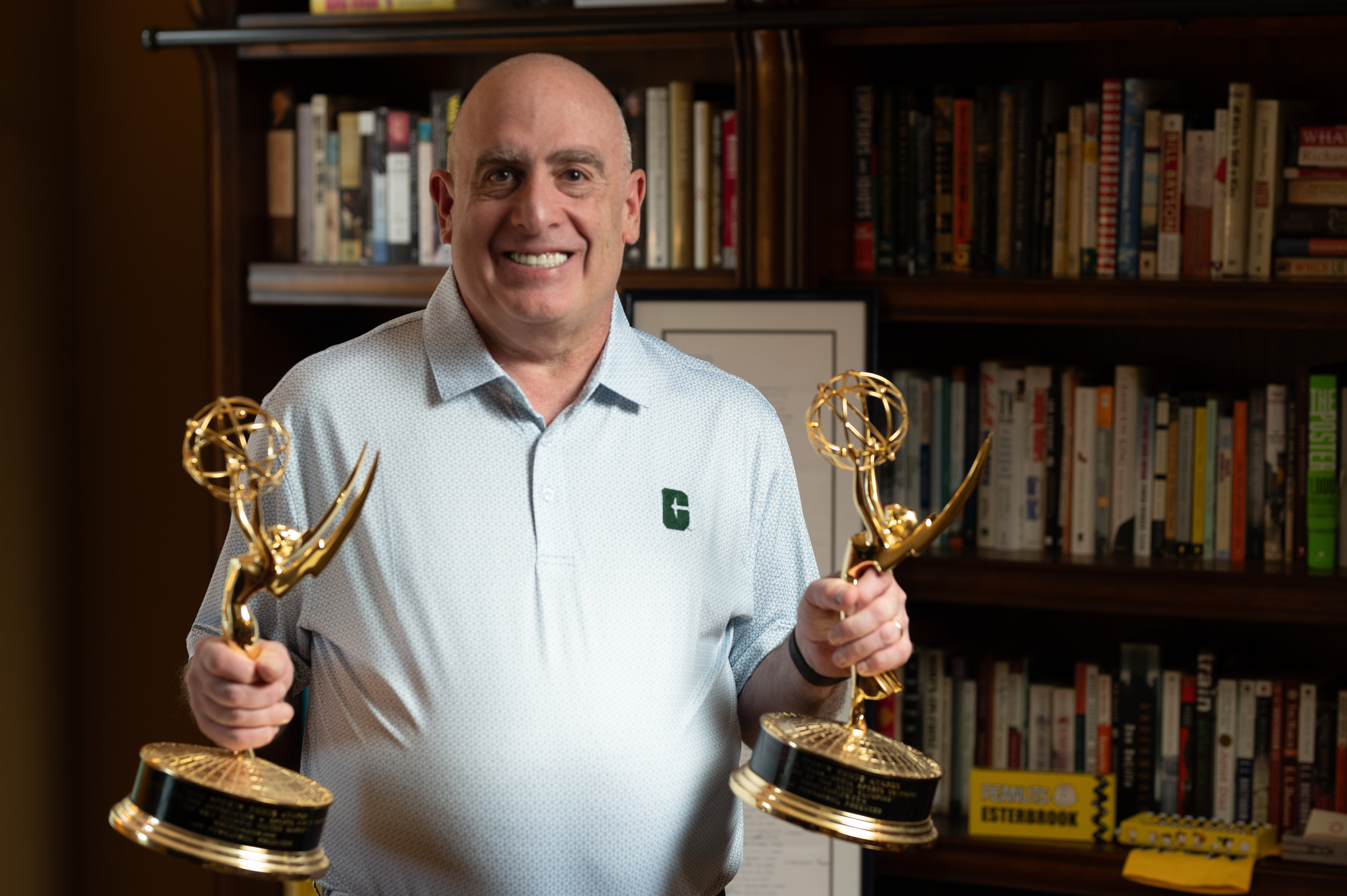 DSC_6677 Joe Posnanski holds his two Emmy awards at his home in Charlotte, North Carolina