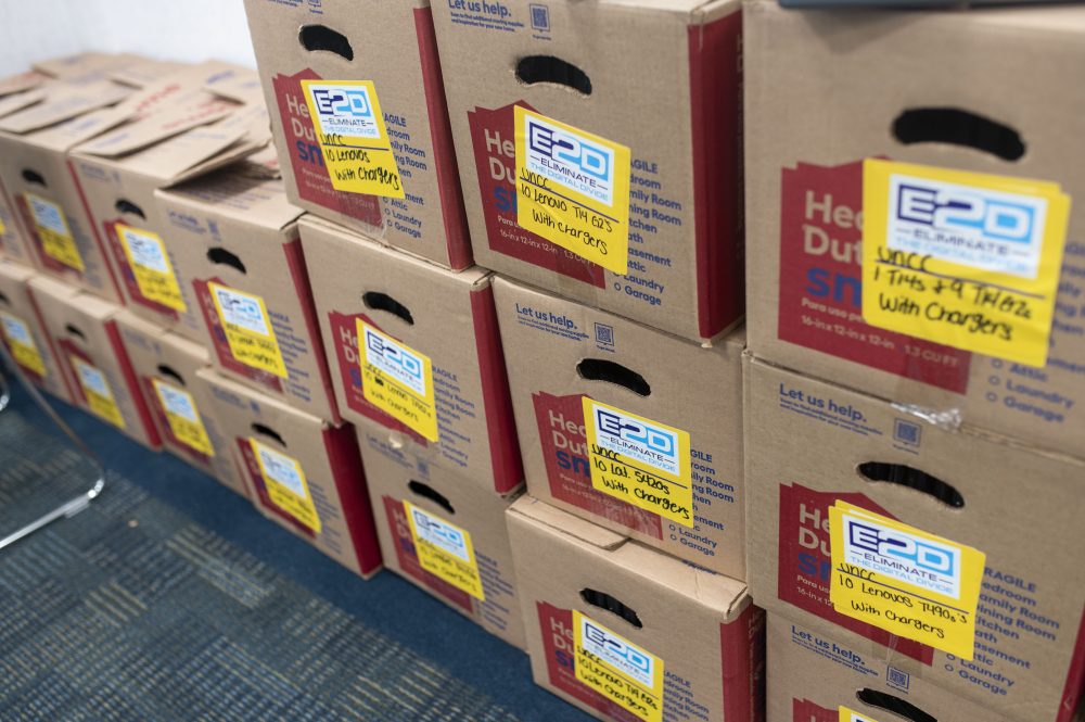 Boxes of E2D refurbished laptops