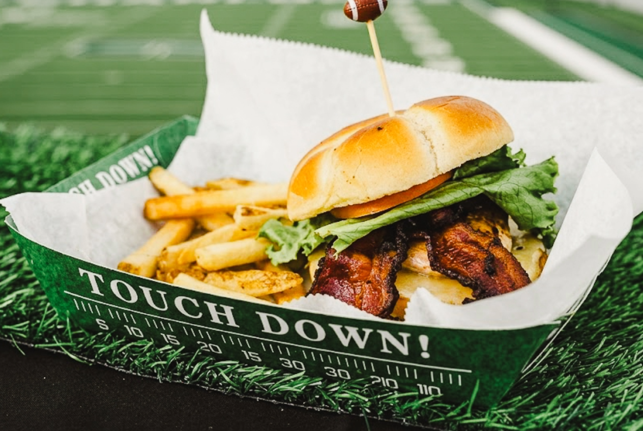 Grilled Chicken Sandwhich (Crop) Grilled chicken sandwich with swiss, jalapeño bacon and a side of fries.
