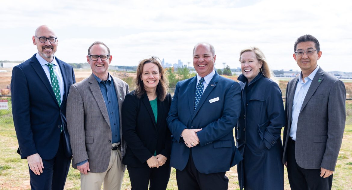 Tara Cavalline and Jack Christine (center) with (l to r) Vice Chancellor John Daniels, Dean Rob Keynton, Chancellor Sharon Gaber and Executive Director Lingguang Song.